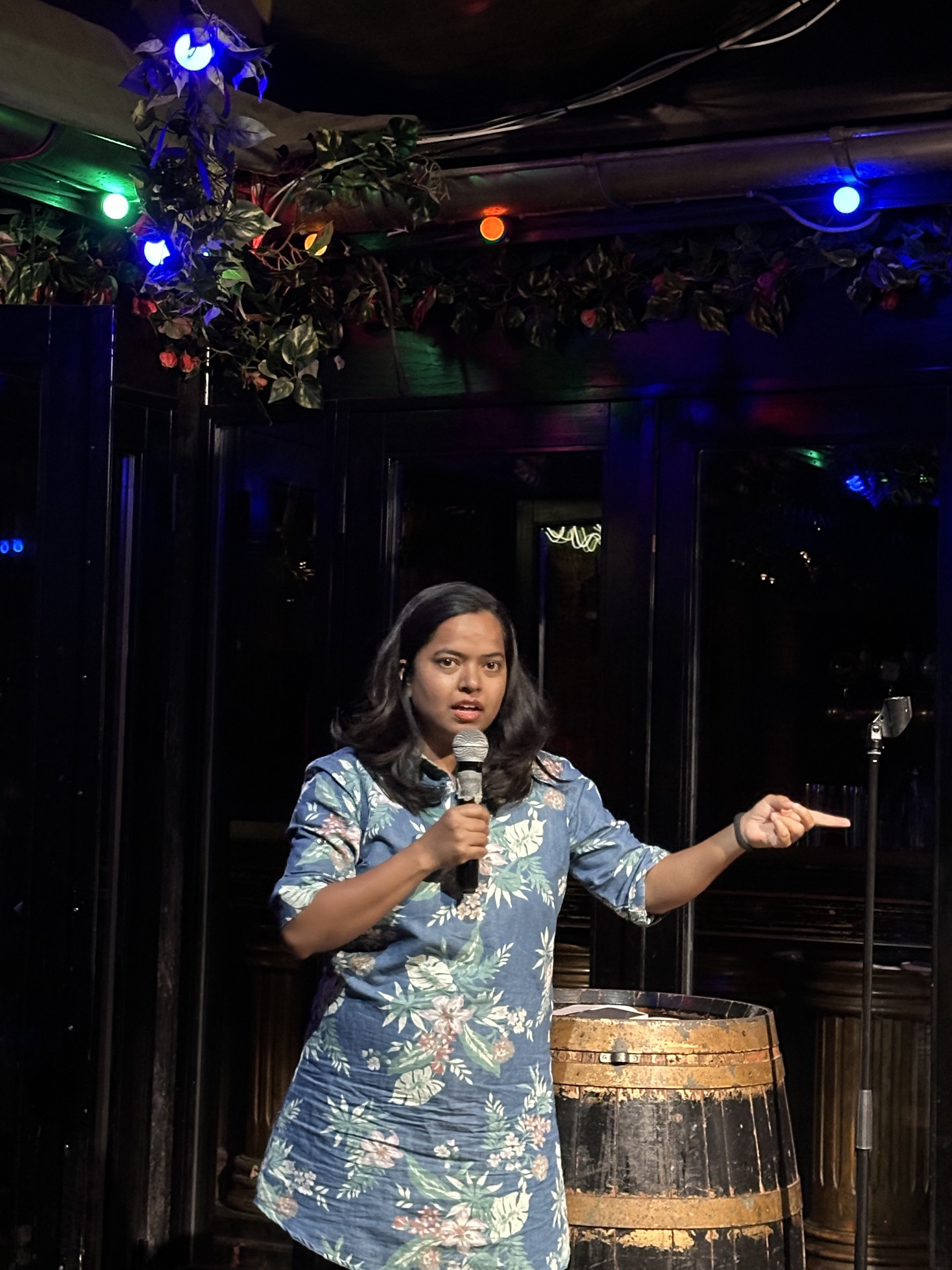 Comedian on stage at Proud Mary