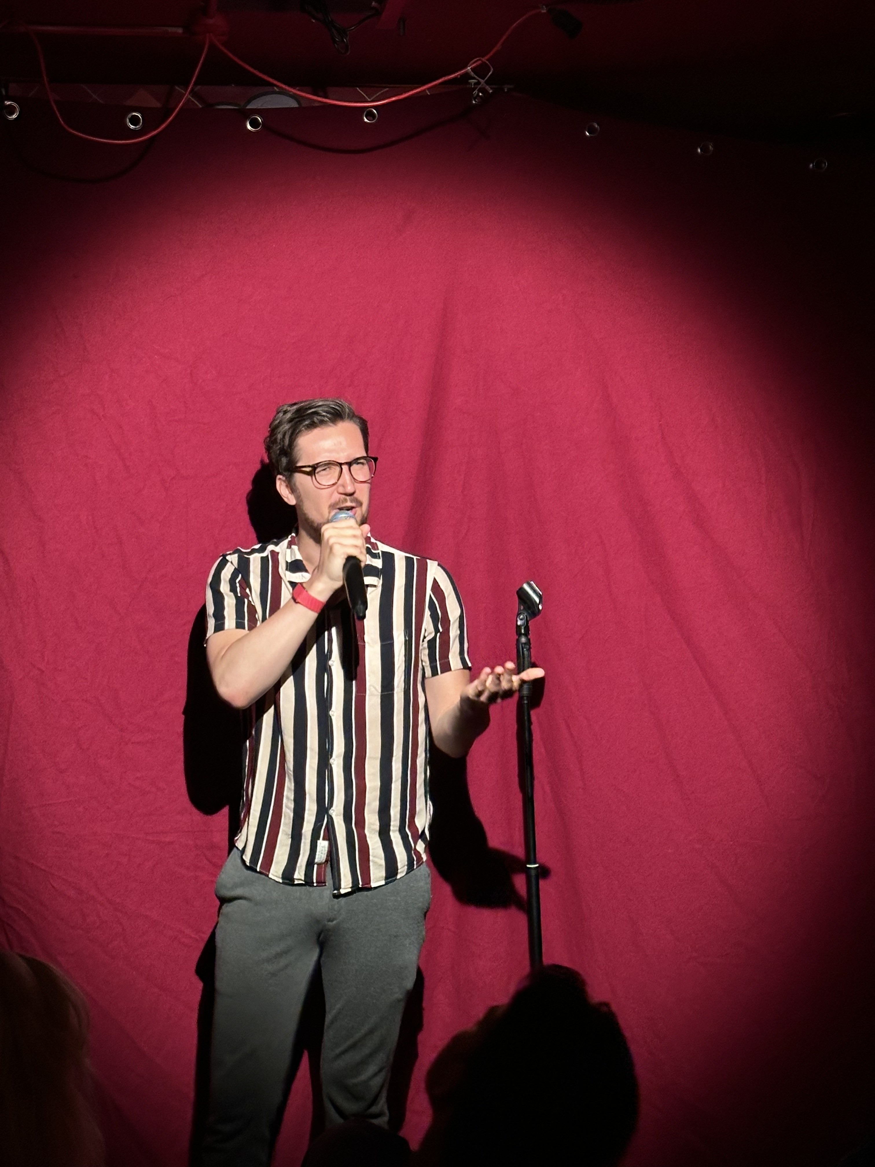 Comedian performing at No Stress