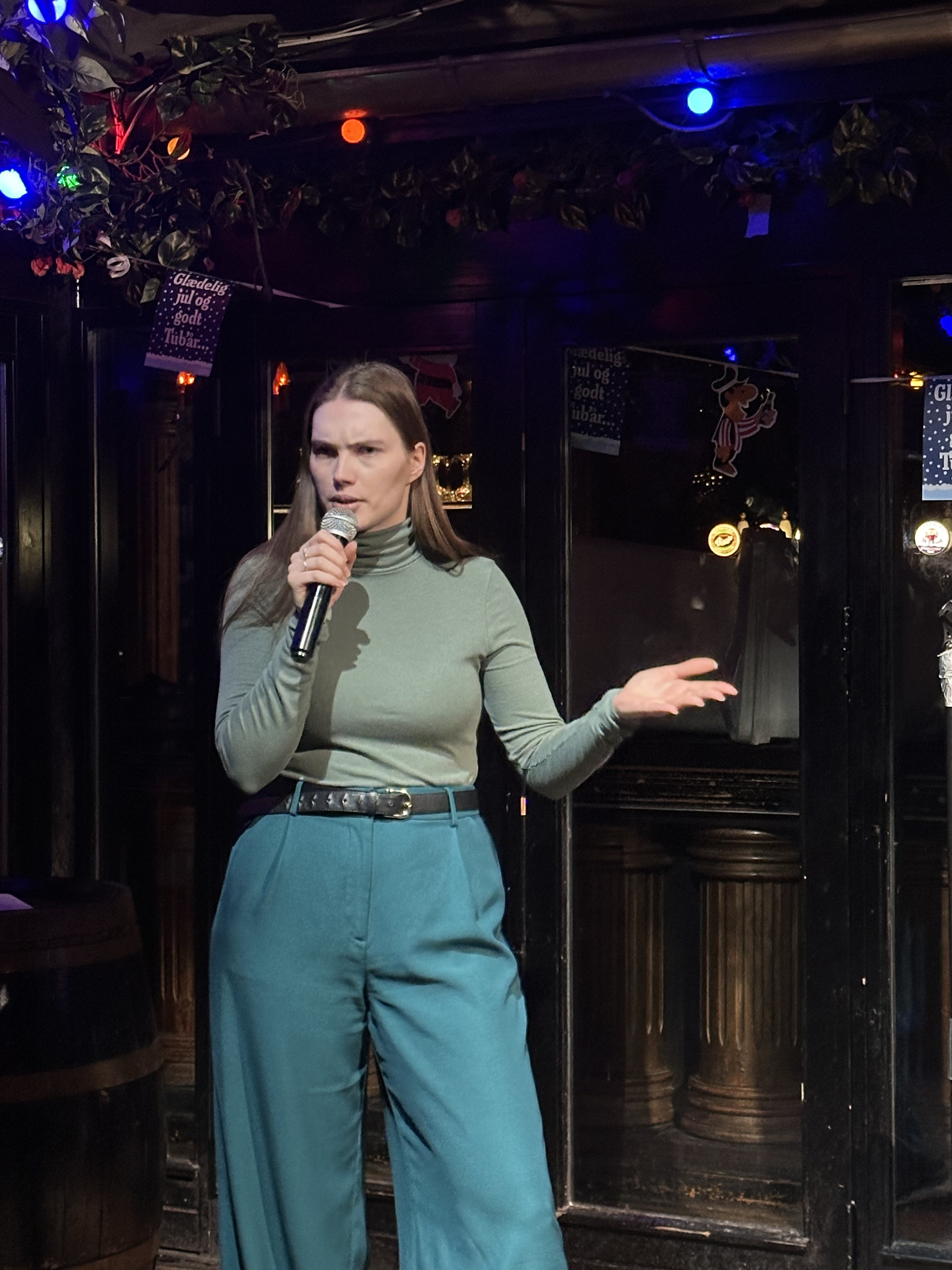 Comedian on stage at Proud Mary